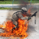 Illustration for article titled These Photos Of Soldiers Executing Fire Phobia Training Will Terrify You